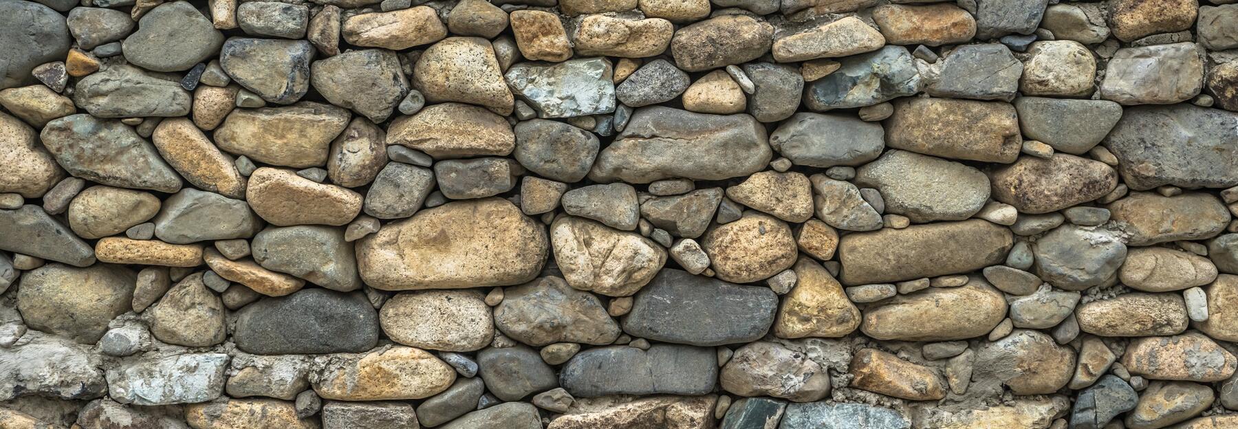 Trockensteinmauer, ohne Mörtel erreichtetes Bauwerk